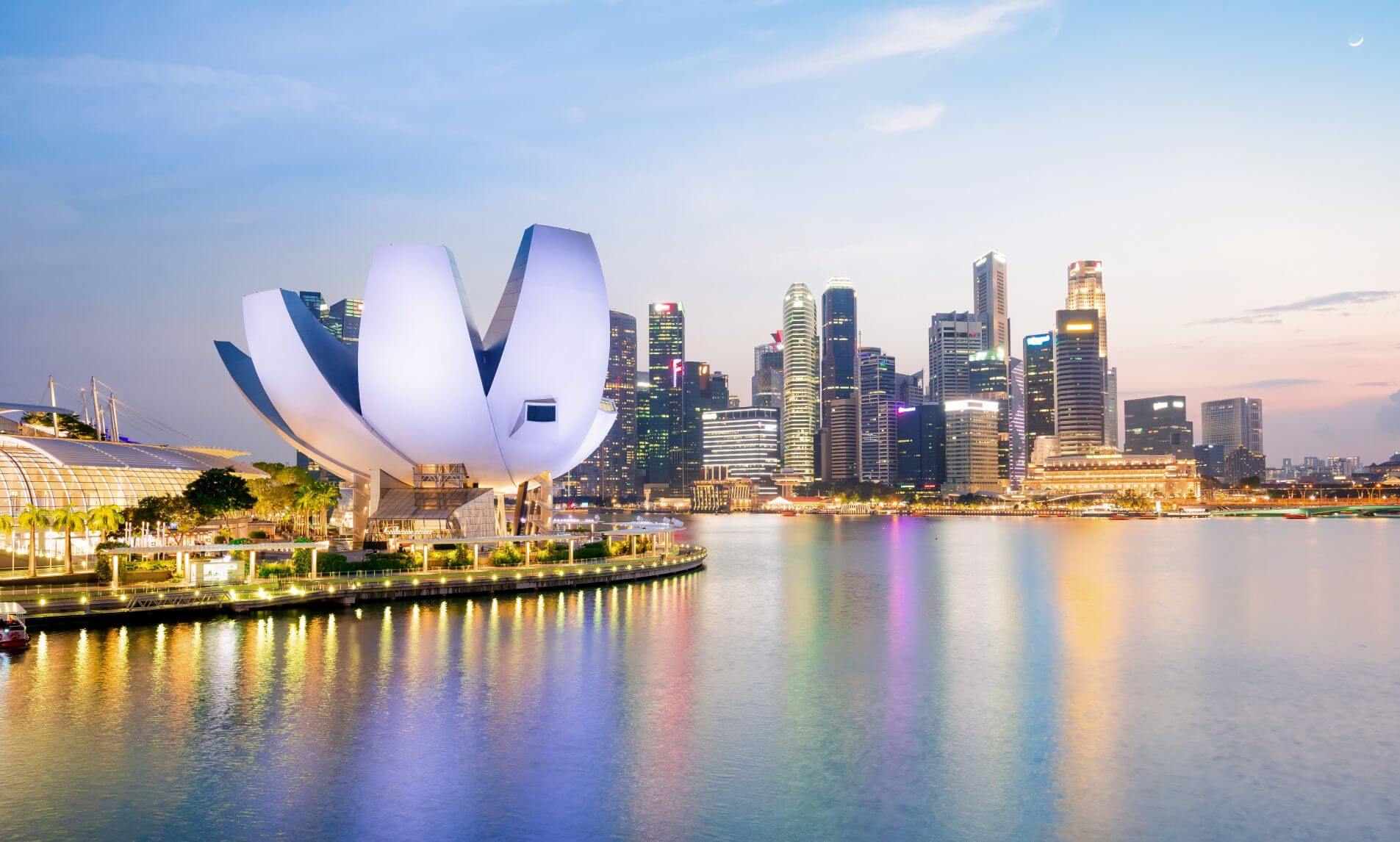 Singapore skyline and Marina Bay at dusk, representing Singapore as a major destination for skilled international professionals and expatriate assignments.